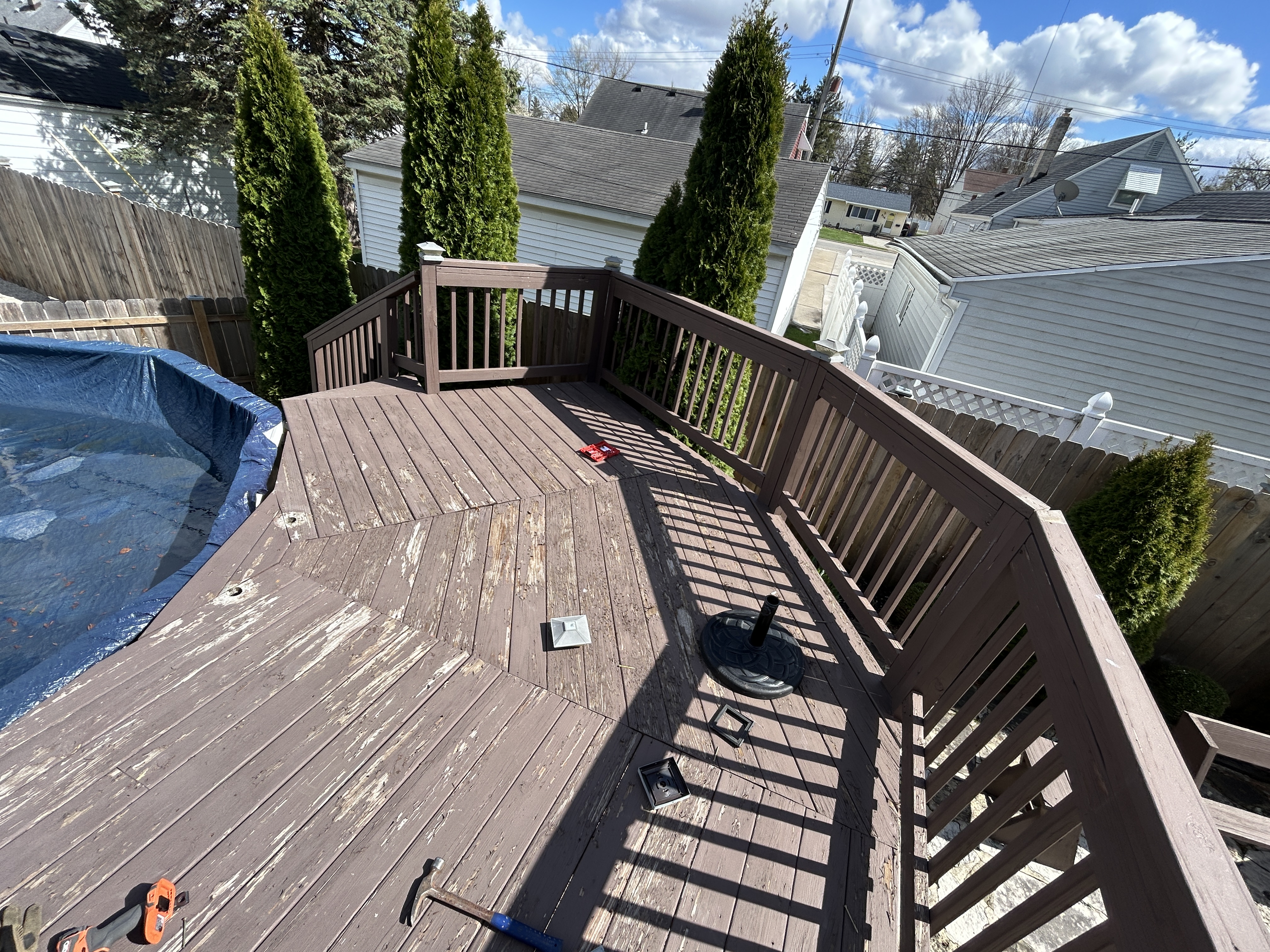 Weathered pool deck before restoration