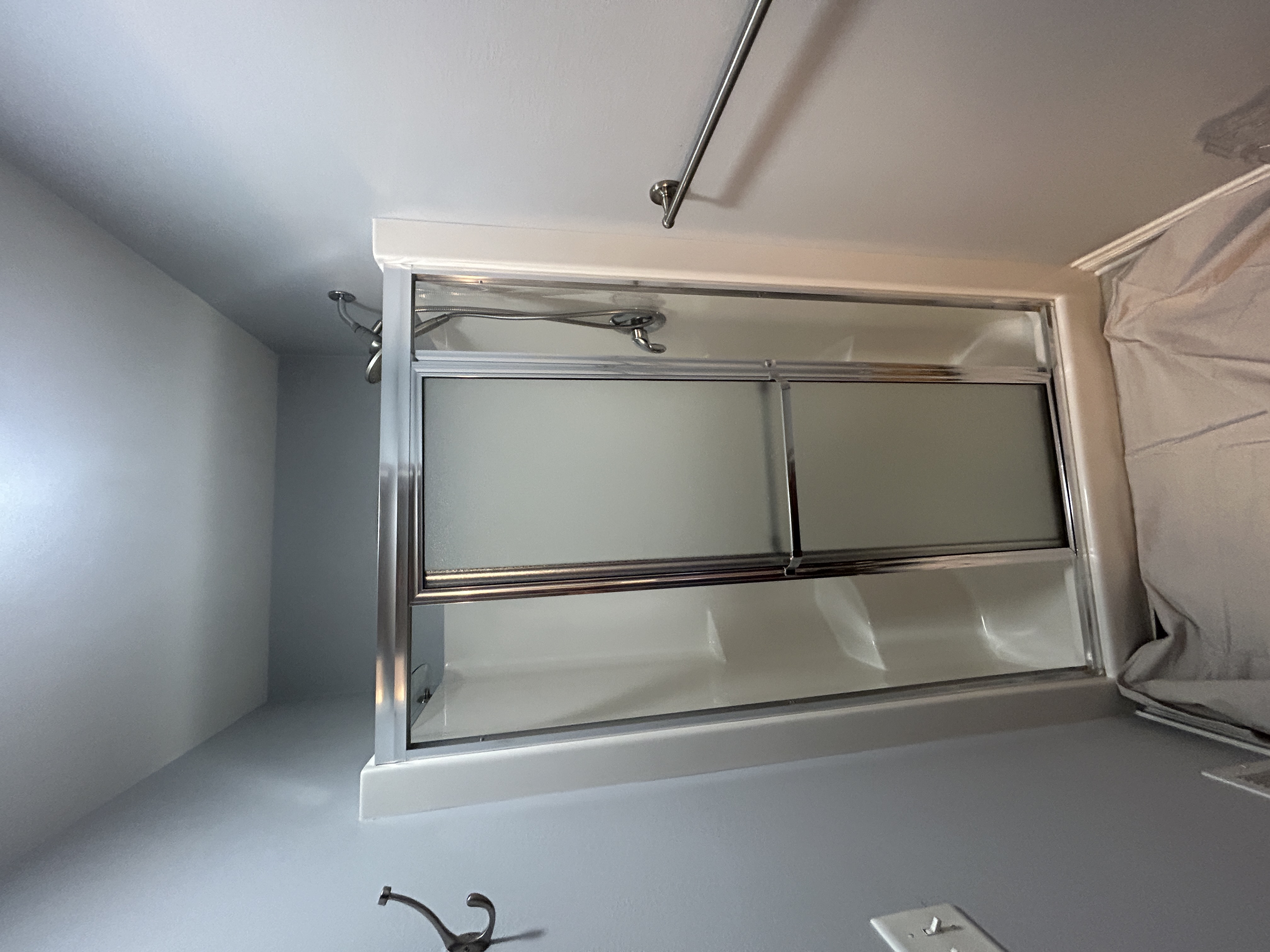 Original enclosed shower before renovation